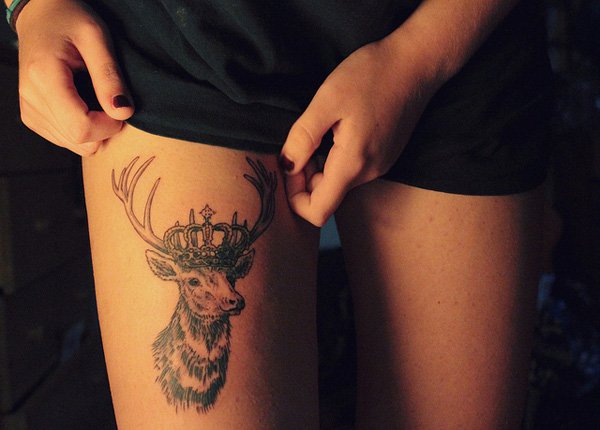 King-of-the-Forest-thigh-tattoo