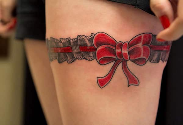 Ribbon-Tattoo-on-thigh