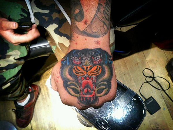 traditional-tattoo tiger on hand 