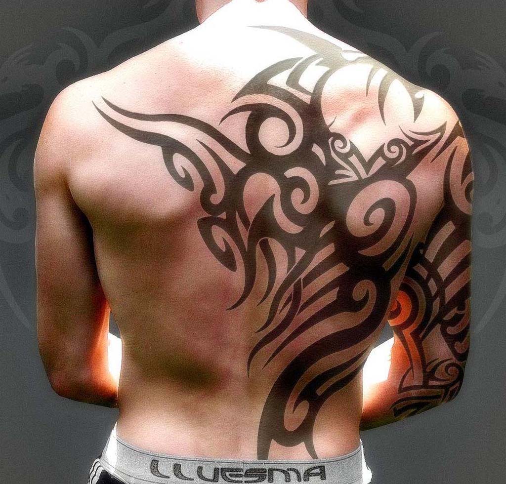 tribal-tattoo-on-back-and-right-sleeve