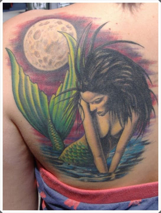 Creative-mermaid-and-moon-tattoo-idea