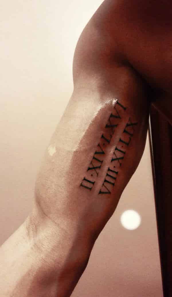 roman-numerals-tattoo-on-arms