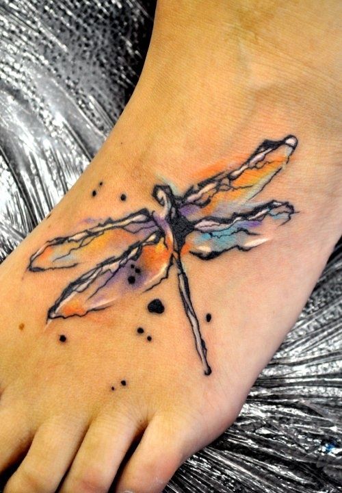 dragonfly tattoo on foot