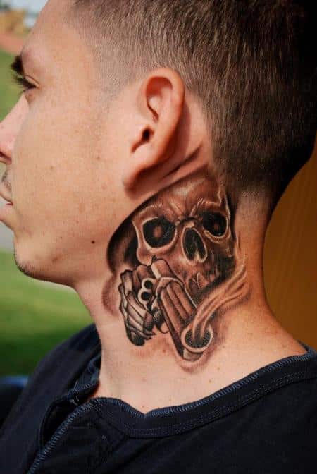 skull-with-gun-tattoo-on-neck