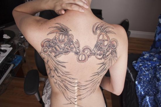 Amazing-back-biomechanical-tattoo-design