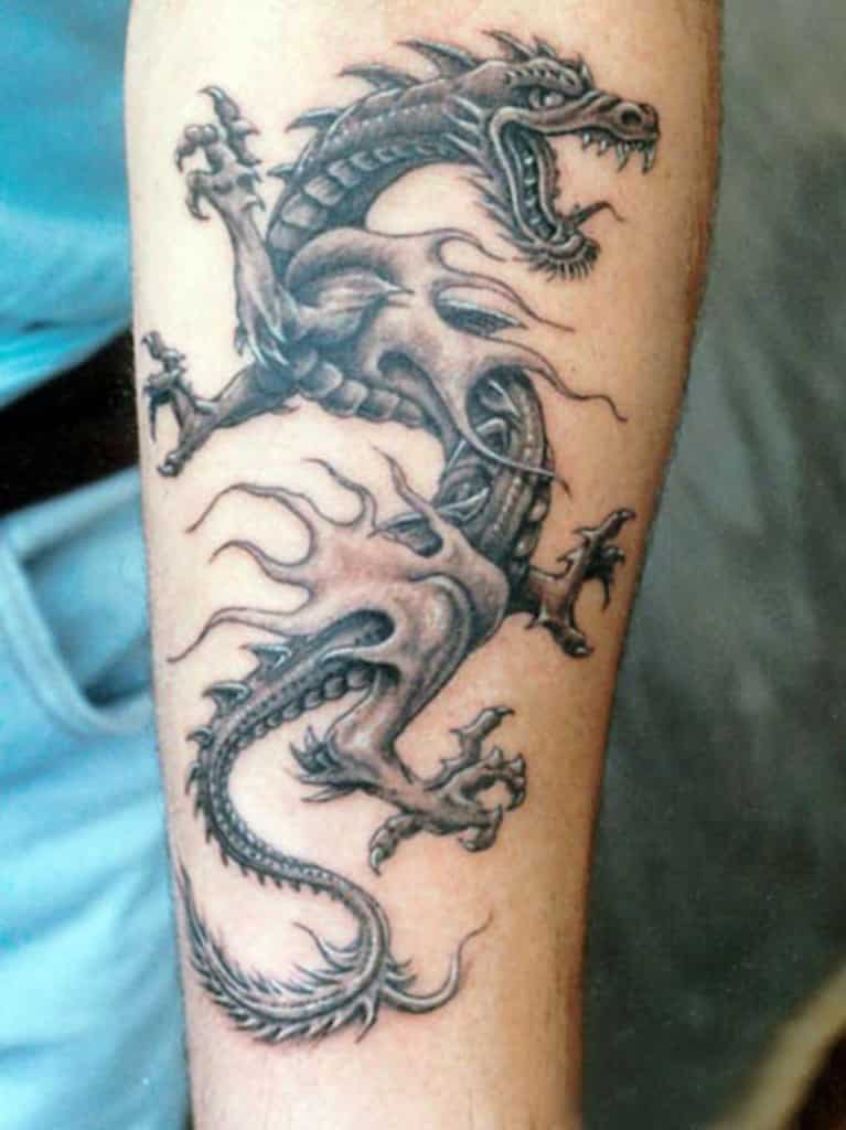 arm-grey-ink-dragon-tattoo