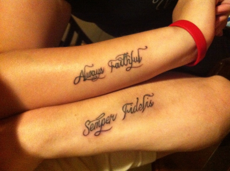 matching couple tattoos on arms