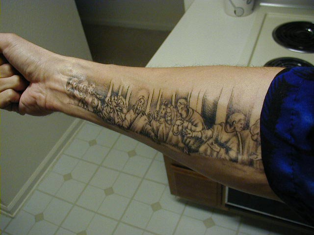 christian tattoo forearm