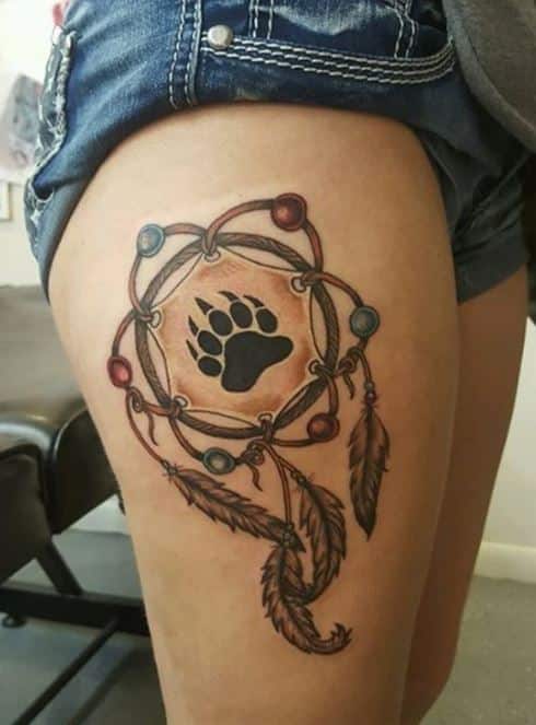 bear-paw-dreamcatcher-tattoos-on-thighs