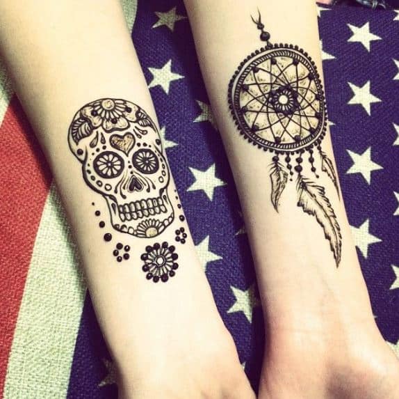 dream catcher tattoos on arms