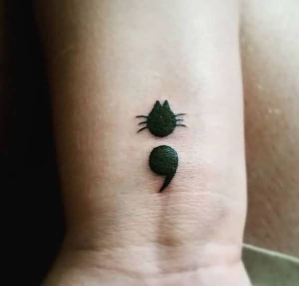 funny nice cat face semicolon tattoo