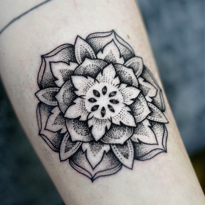 dotwork mandala design tattoo