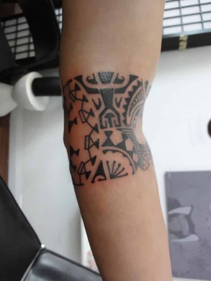 Black Ink Armband Tattoo On Elbow