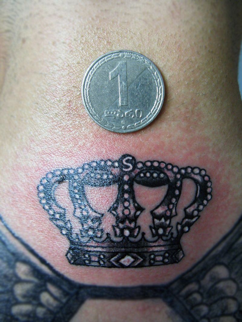 back neck crown tattoo