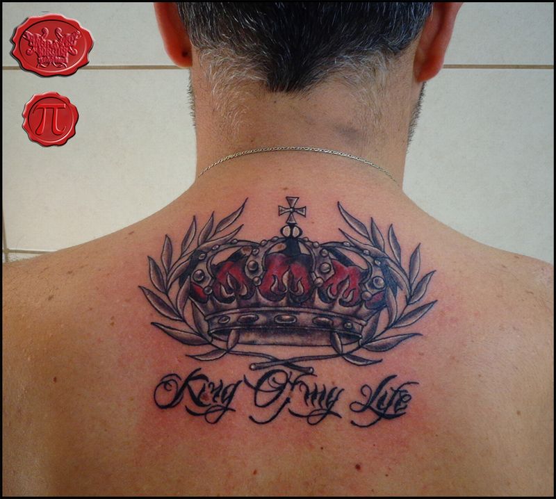 cross with king crown tattoo on shoulder