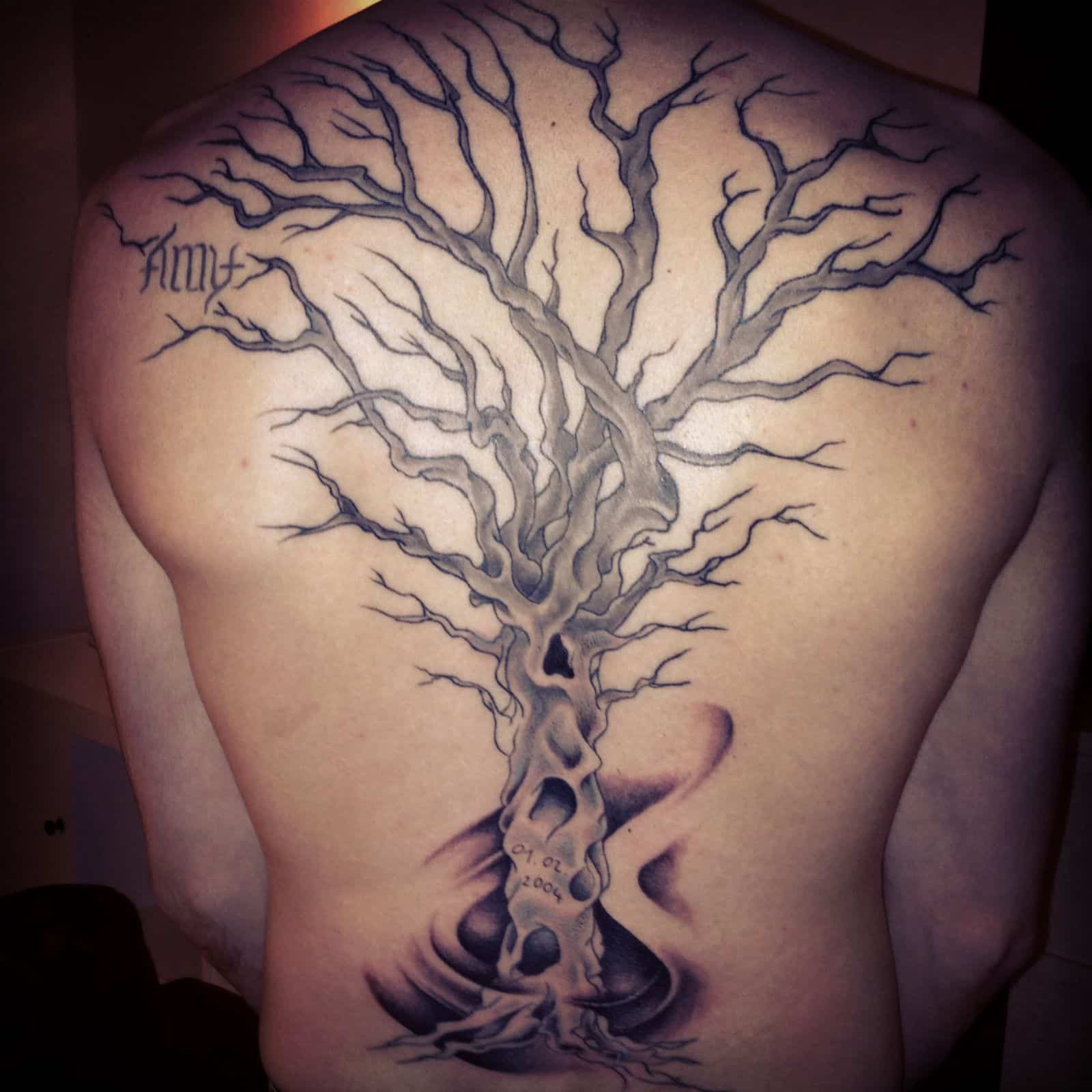 dead tree tatto on back