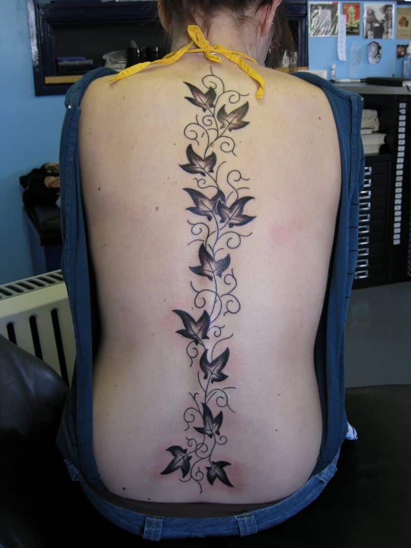 grey ink ivy vine flowers spine tattoo for girls
