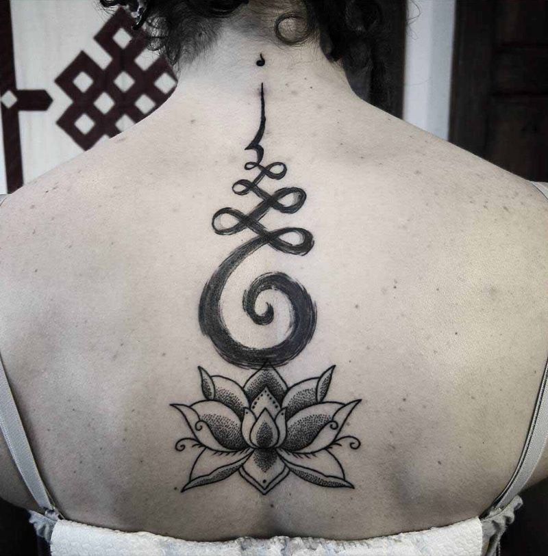 outstanding design and lotus spine tattoo by francesco blackbindu