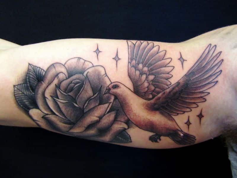 Awesome Flying Dove And Rose Flower Tattoo