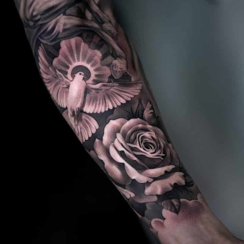 Grey Rose And Flying Dove Tattoo On Left Forearm