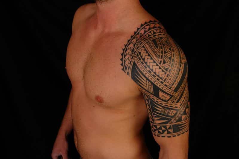 Half Tribal Sleeve Tattoos