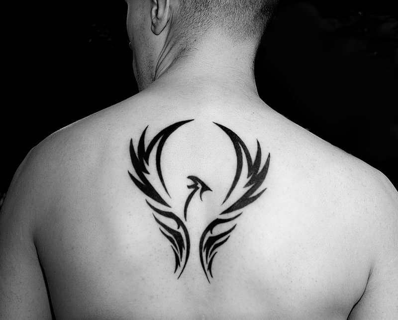 Interesting Idea For A Phoenix Tattoo