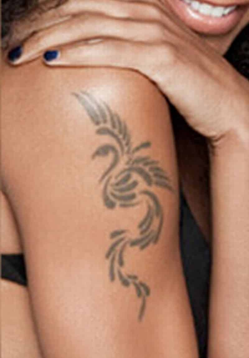 Phoenix Tattoo On Girl Bicep