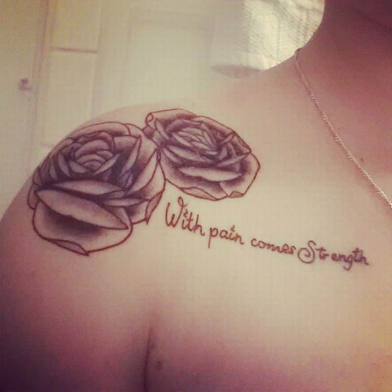 Rose Flowers Strength Tattoo On Right Shoulder