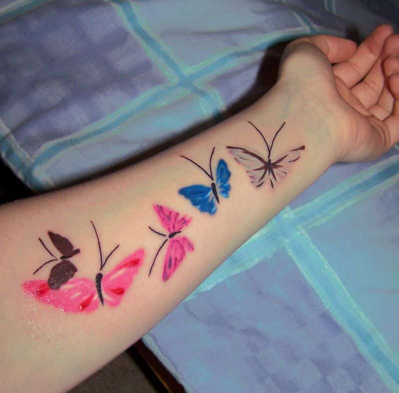  Colored Butterfly Tattoos On Left Forearm
