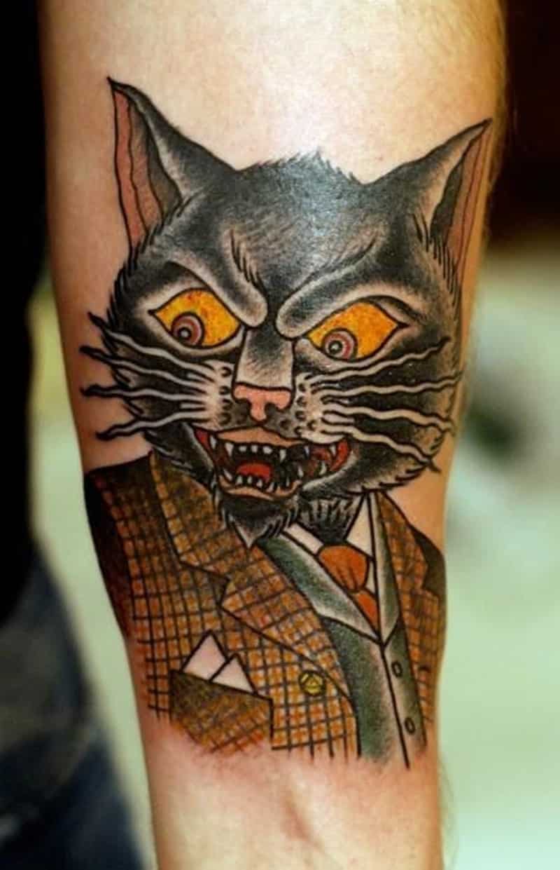 Coloured Angry Cat In A Suit Forearm Tattoo