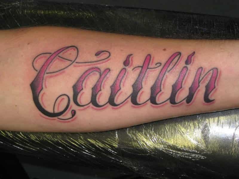 Caitlin Word Tattoo On Forearm