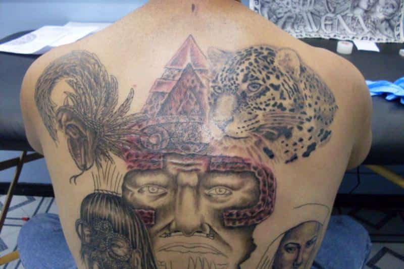 Most beautiful aztec back piece tattoos for men